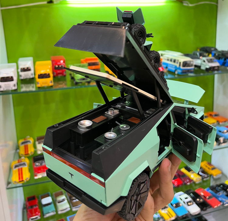 ماشین فلزی تسلا سایبرتراک کمپردار ۲۴ سانتی ۶ درب بازشو عقبکش